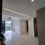 Finished living room with a linear ceiling LED, black ceiling fan, marble floor, and balcony sliding door, by Best Volt.